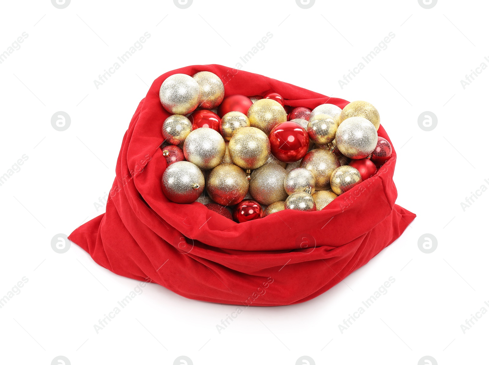 Photo of Red Santa Claus bag with baubles isolated on white