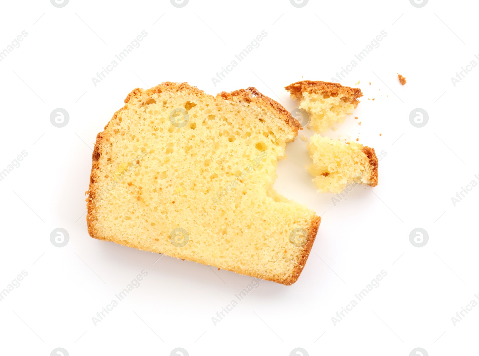 Photo of Slice of freshly baked sponge cake isolated on white, top view