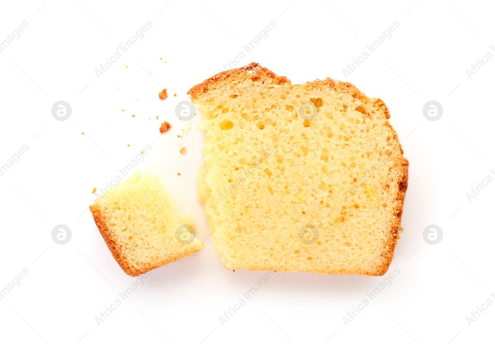 Photo of Slice of freshly baked sponge cake isolated on white, top view