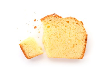 Photo of Slice of freshly baked sponge cake isolated on white, top view