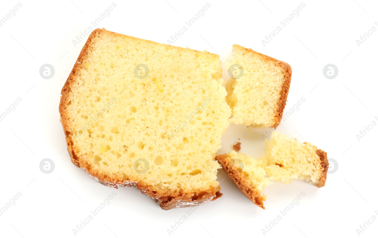 Photo of Slice of freshly baked sponge cake isolated on white, top view