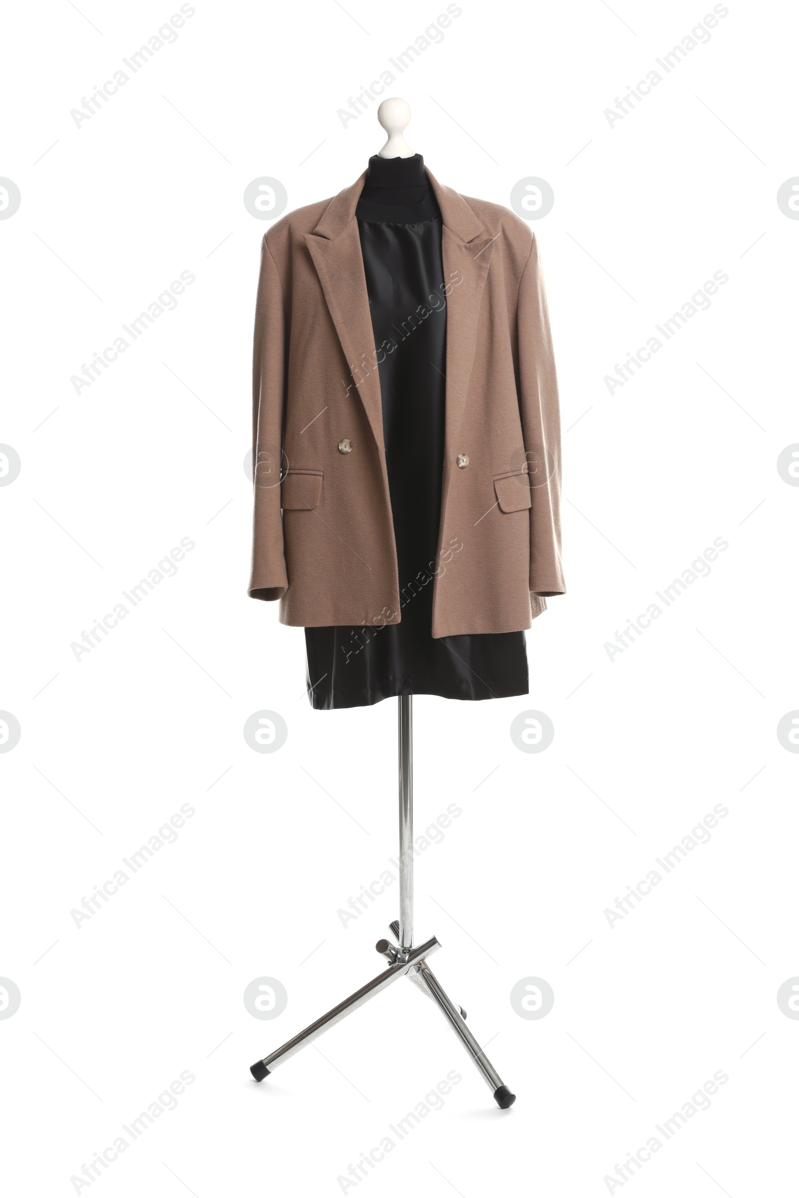 Photo of Female mannequin with stylish brown jacket and black dress isolated on white