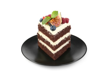 Photo of Piece of delicious chocolate sponge cake with berries isolated on white