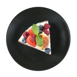 Photo of Piece of delicious chocolate sponge cake with berries isolated on white, top view