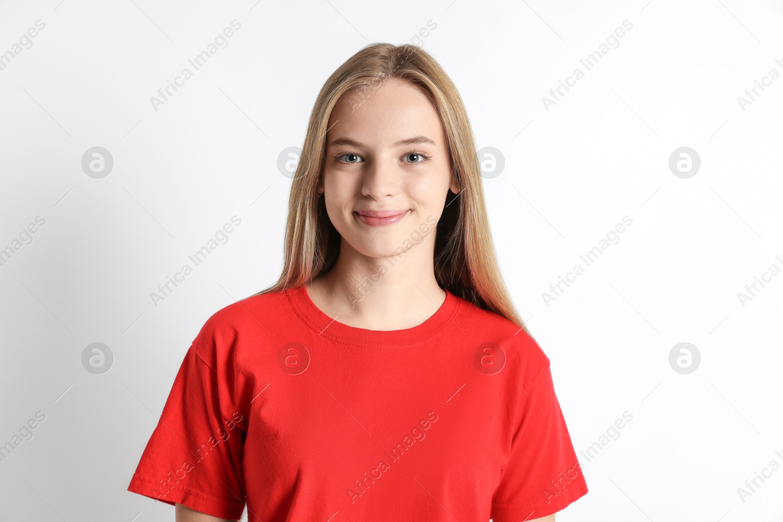 Photo of Portrait of teenage girl on white background