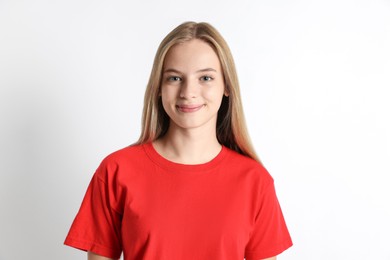 Photo of Portrait of teenage girl on white background