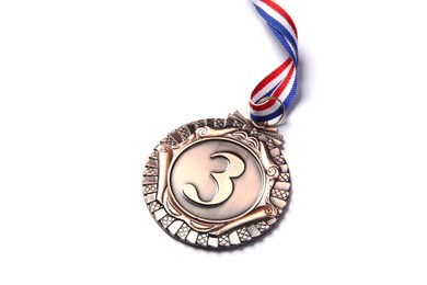 Photo of One bronze medal with ribbon isolated on white