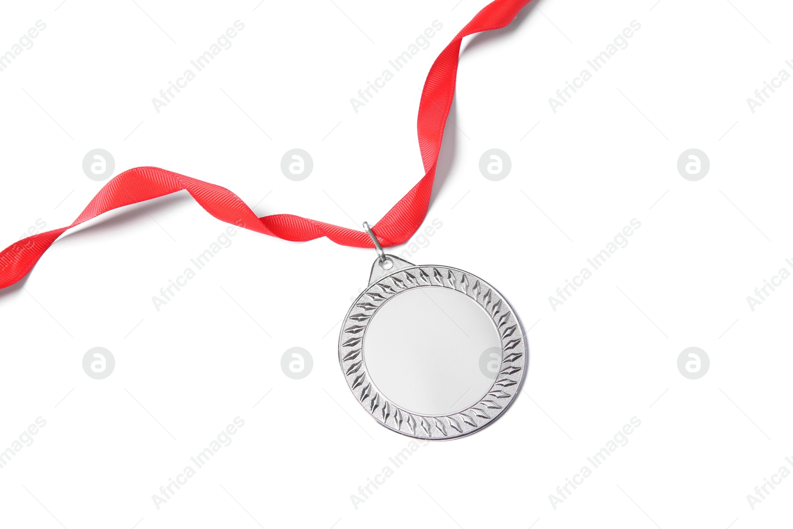 Photo of One silver medal isolated on white, above view