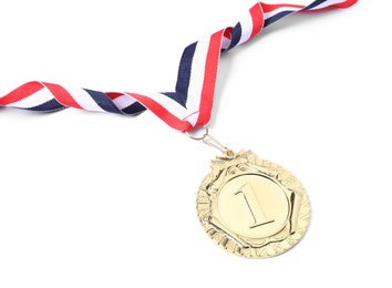 Photo of Golden medal with striped ribbon isolated on white