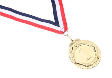 Photo of Golden medal with striped ribbon isolated on white