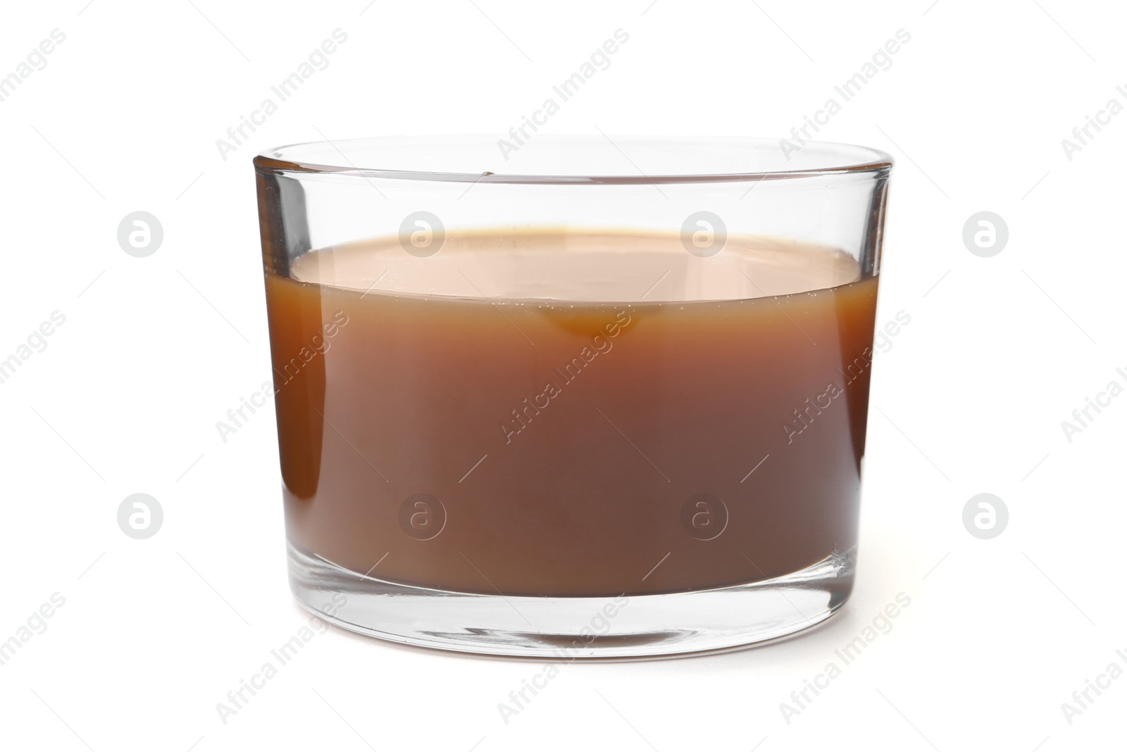 Photo of Tasty caramel sauce in glass bowl isolated on white