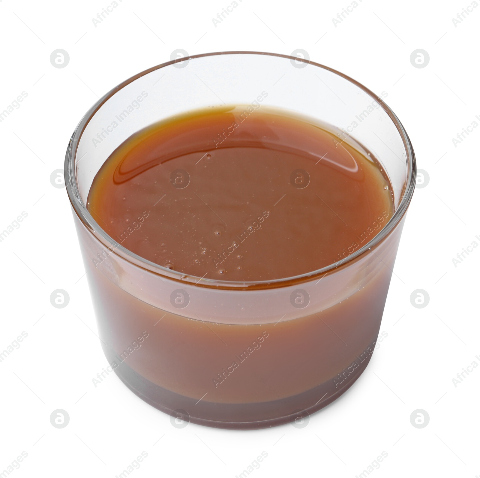 Photo of Tasty caramel sauce in glass bowl isolated on white