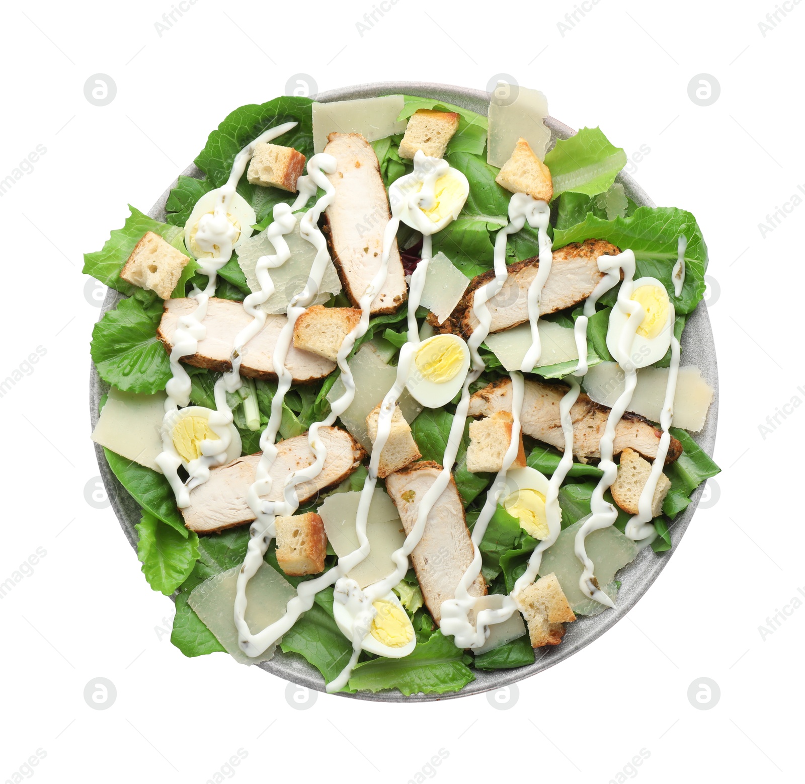 Photo of Delicious Caesar salad with chicken isolated on white, top view