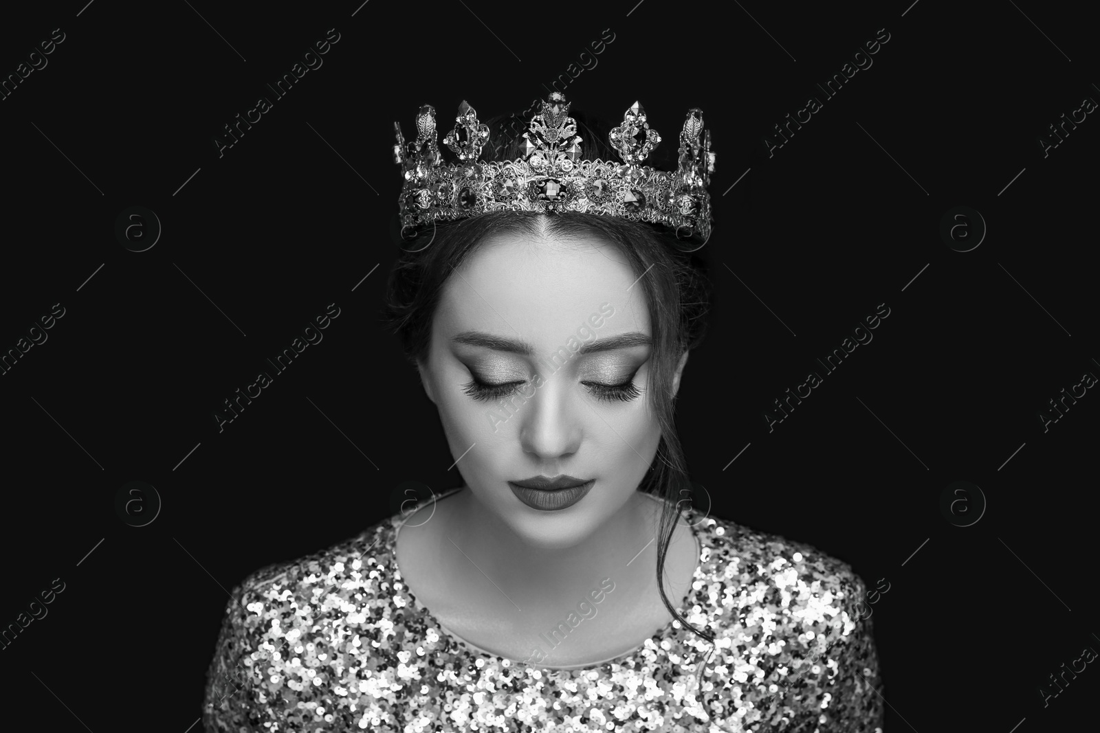 Image of Black-and-white portrait of beautiful young woman with luxury crown