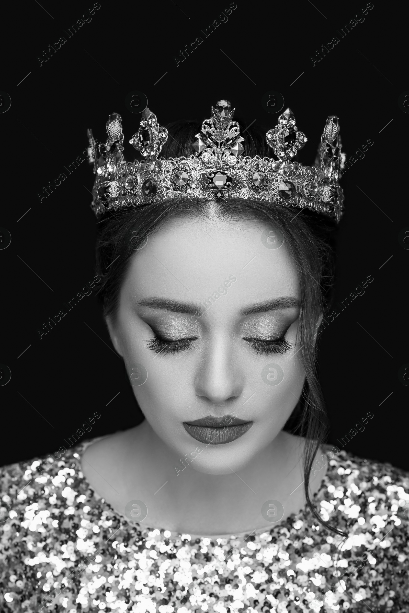 Image of Black-and-white portrait of beautiful young woman with luxury crown