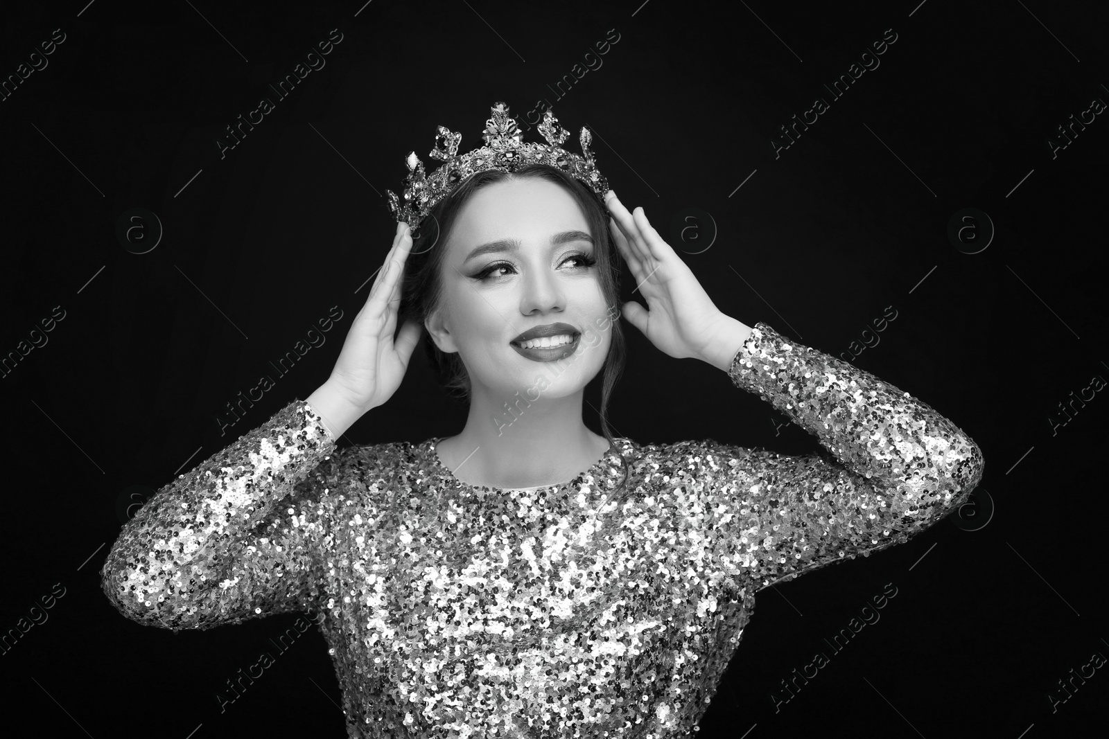 Image of Black-and-white portrait of beautiful young woman with luxury crown