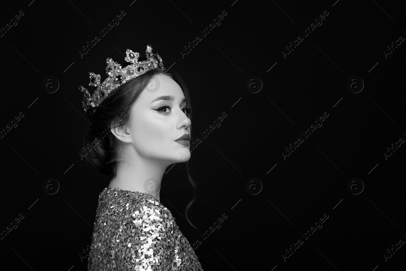 Image of Black-and-white portrait of beautiful young woman with luxury crown