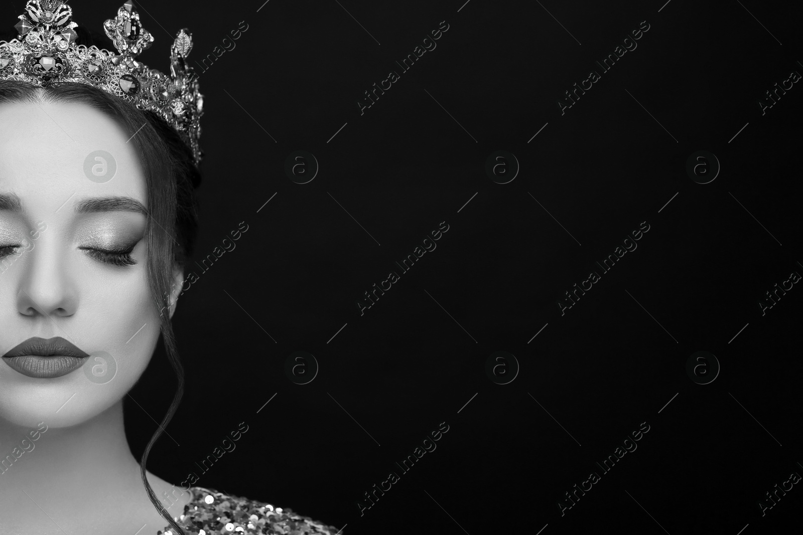 Image of Black-and-white portrait of beautiful young woman with luxury crown