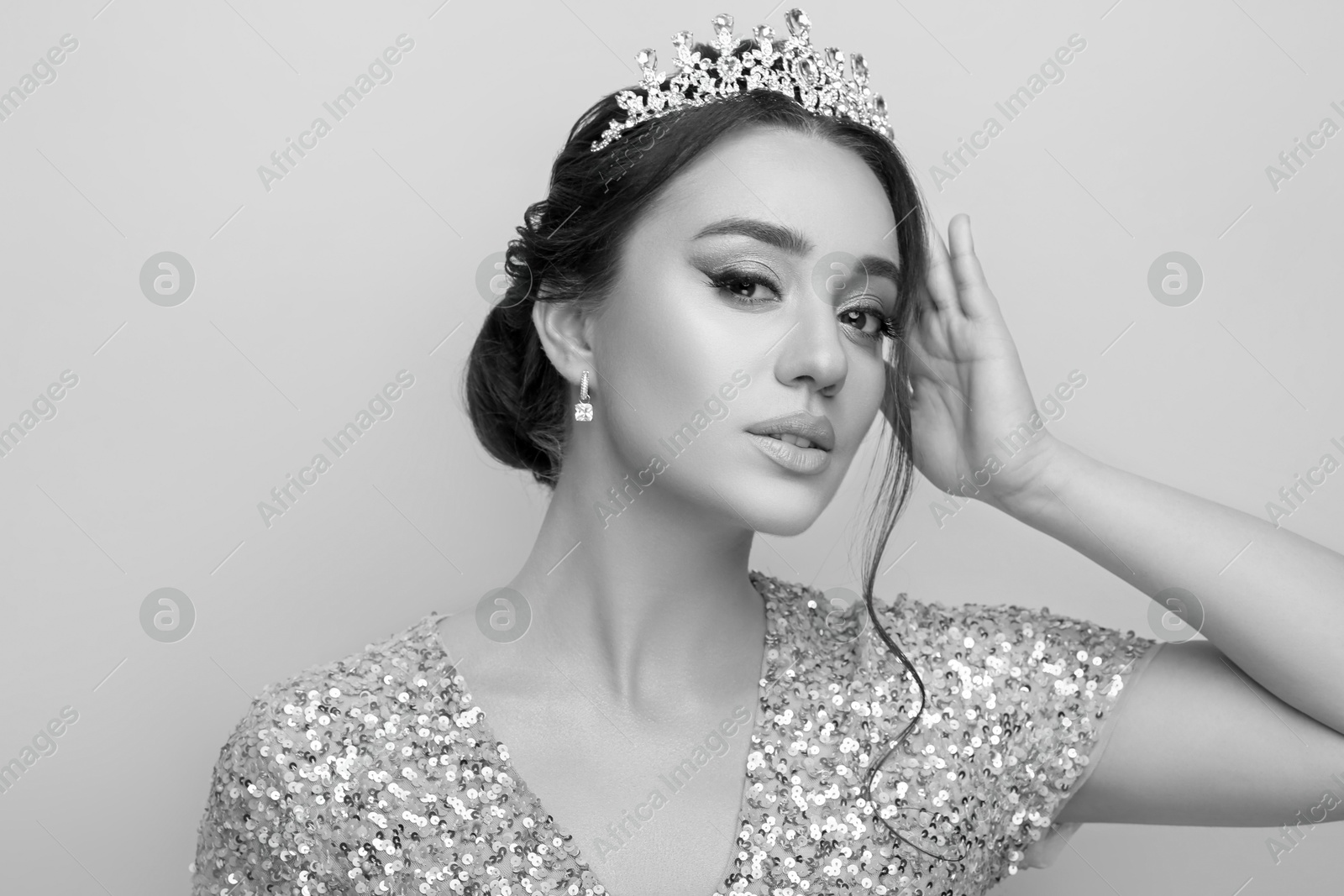 Image of Black-and-white portrait of beautiful young woman with luxury crown