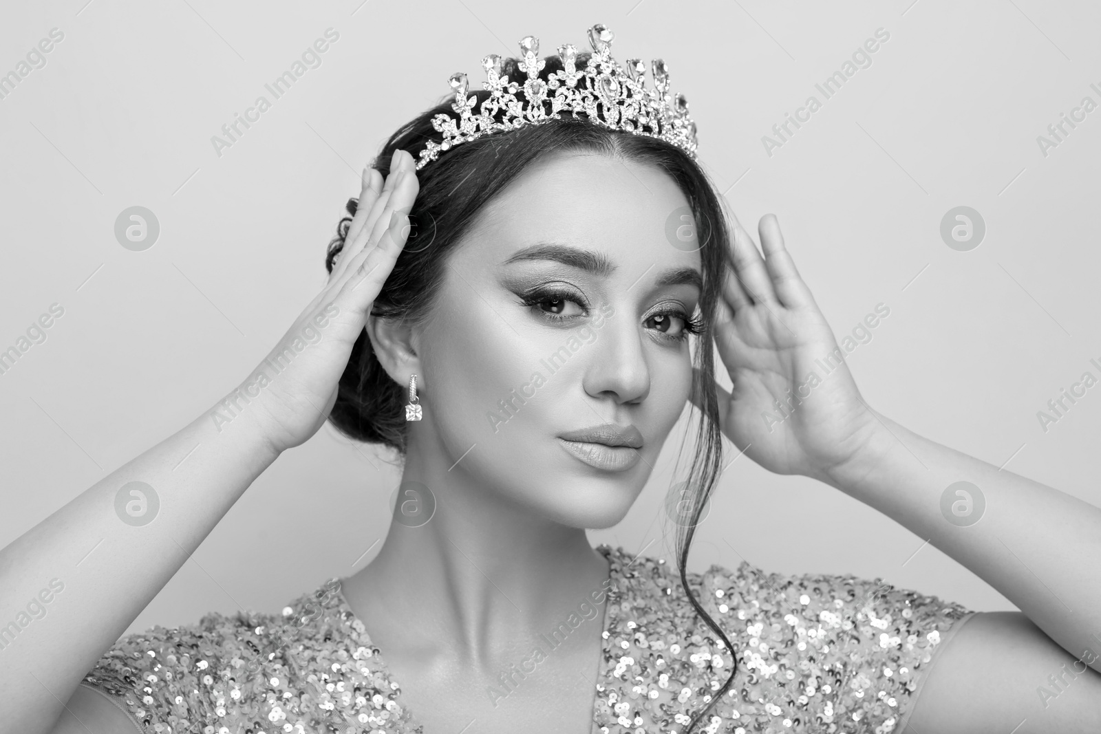 Image of Black-and-white portrait of beautiful young woman with luxury crown