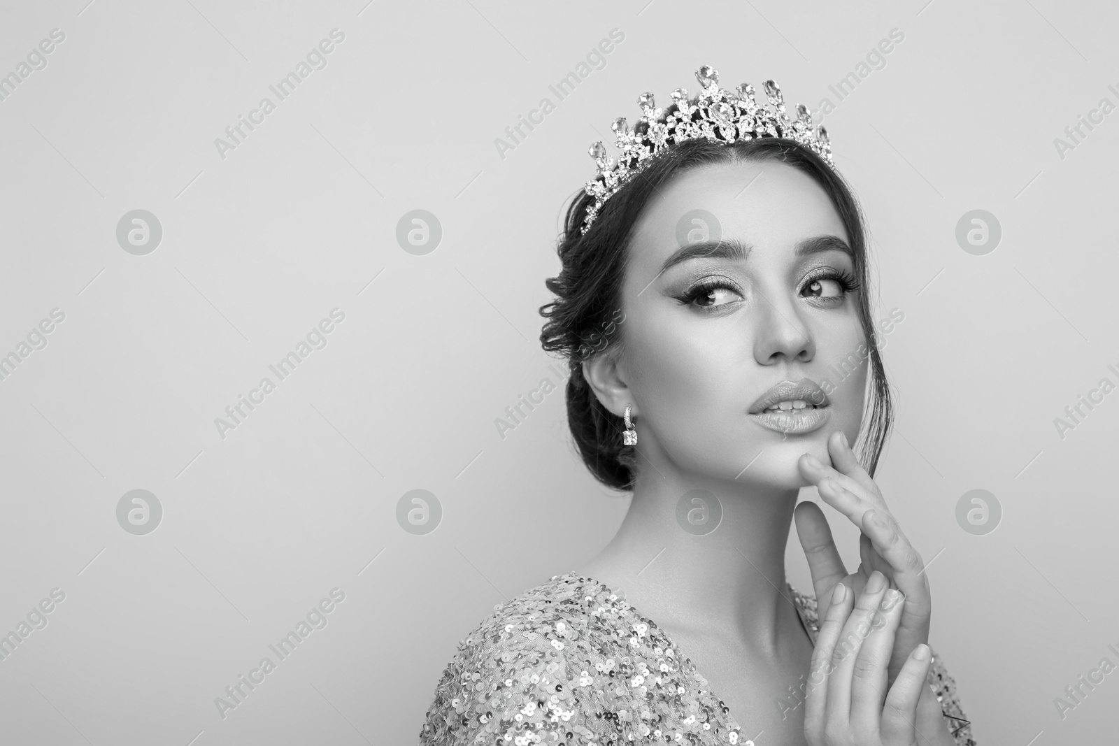 Image of Black-and-white portrait of beautiful young woman with luxury crown