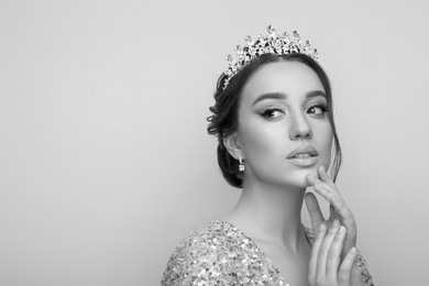 Image of Black-and-white portrait of beautiful young woman with luxury crown