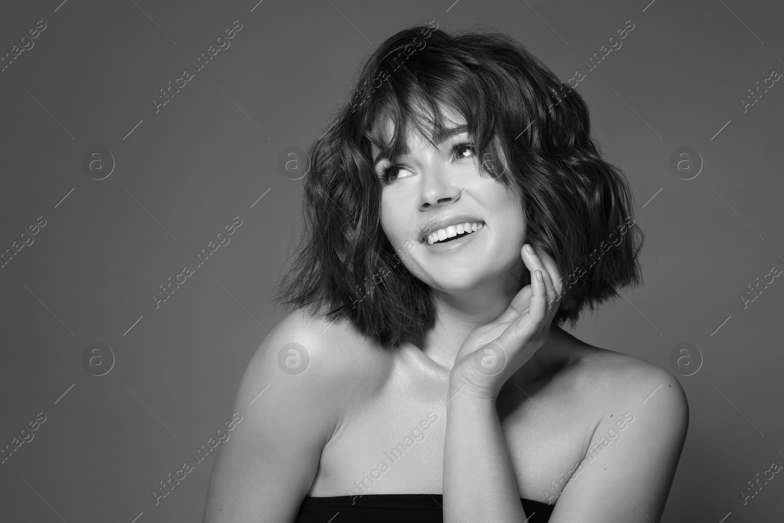 Image of Portrait of beautiful young woman. Black-and-white photo