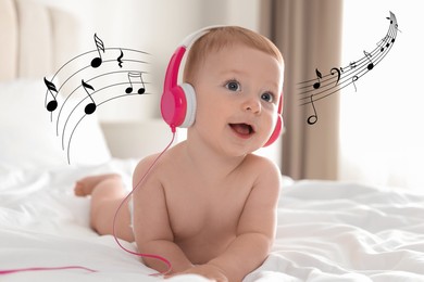 Cute little baby with headphones on bed at home. Music notes flying near child