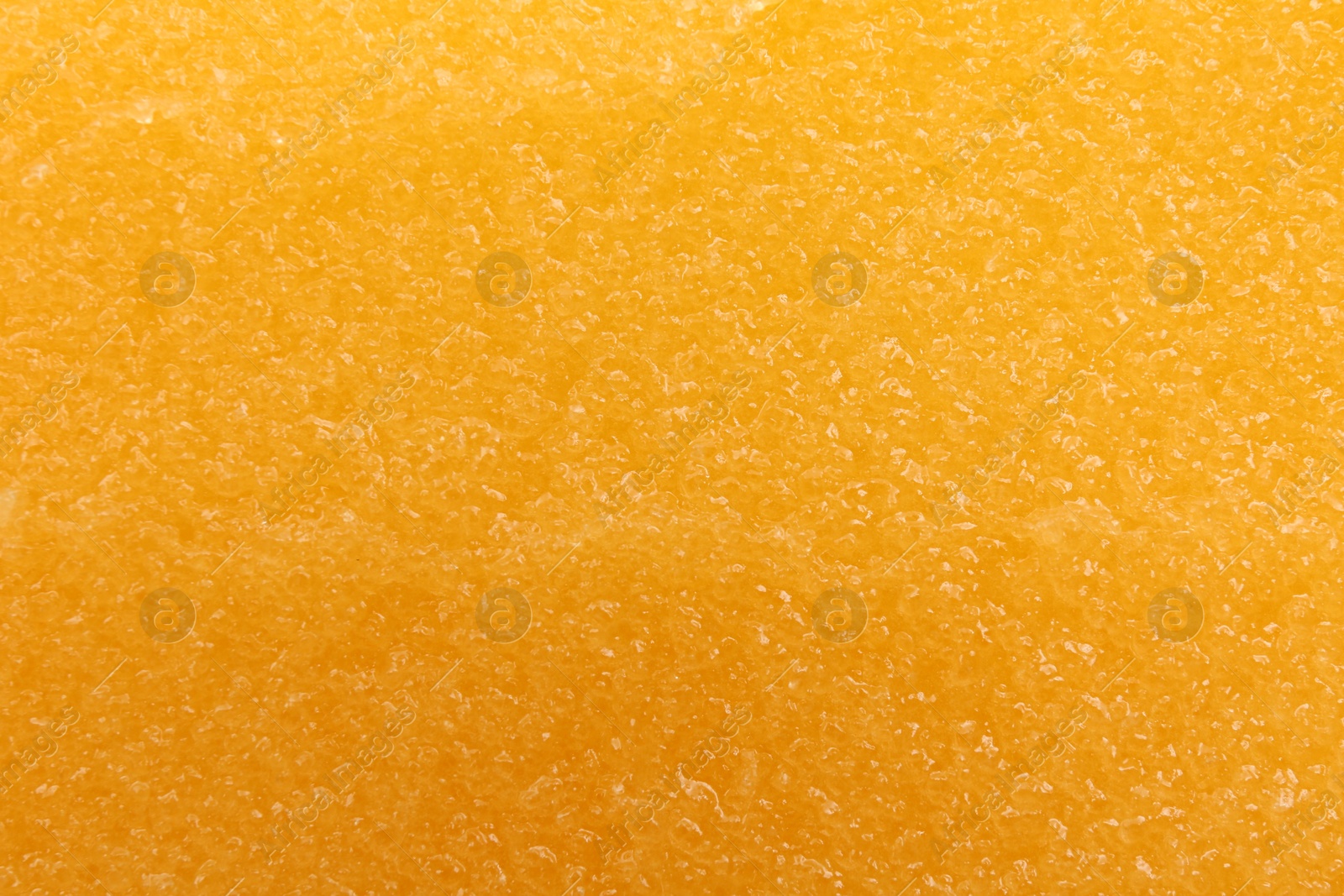 Photo of Sample of natural body scrub as background, closeup