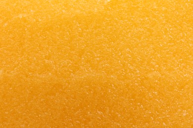 Photo of Sample of natural body scrub as background, closeup