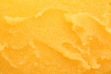 Photo of Sample of natural body scrub as background, closeup