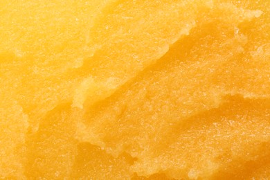 Photo of Sample of natural body scrub as background, closeup