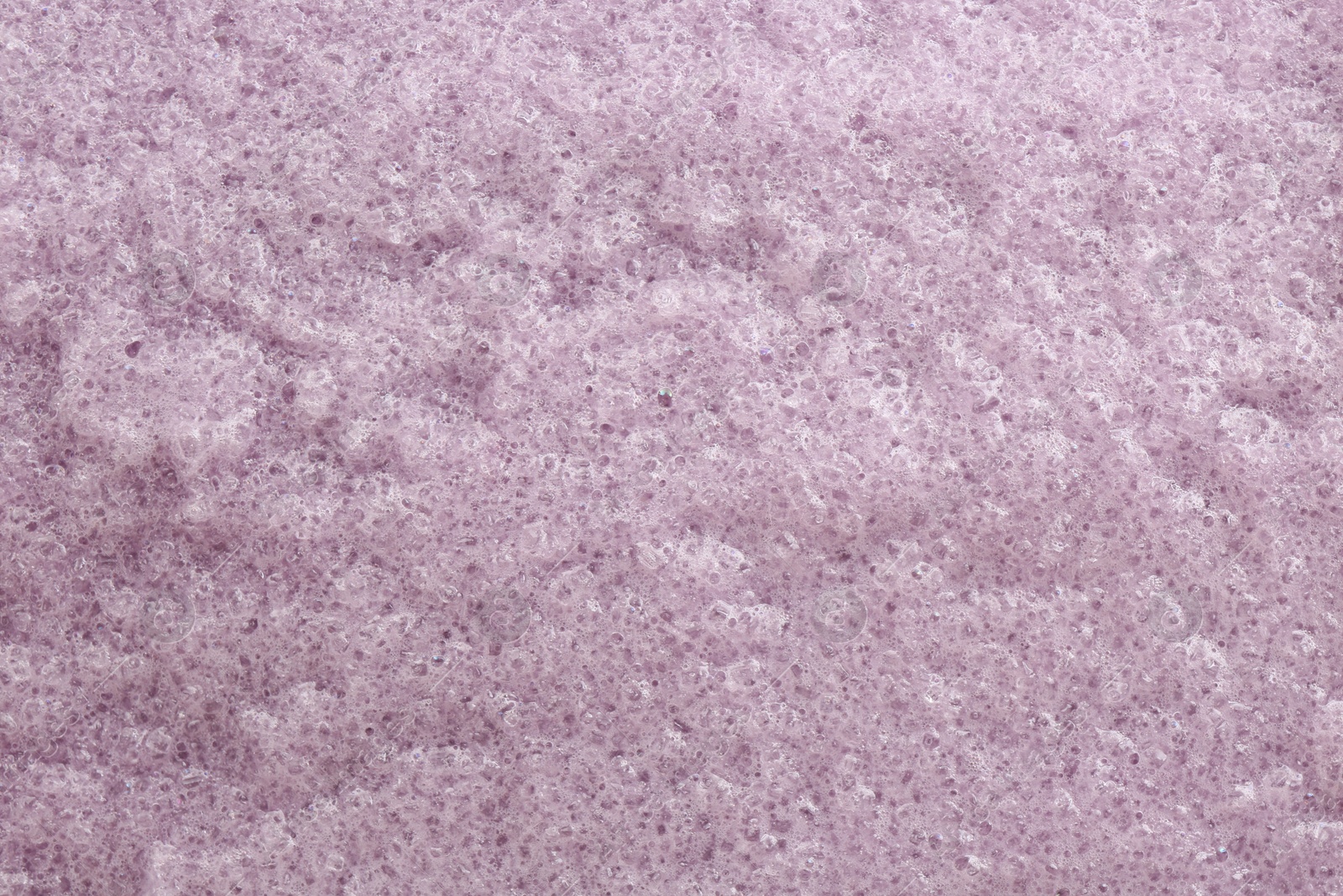 Photo of Sample of natural body scrub as background, closeup