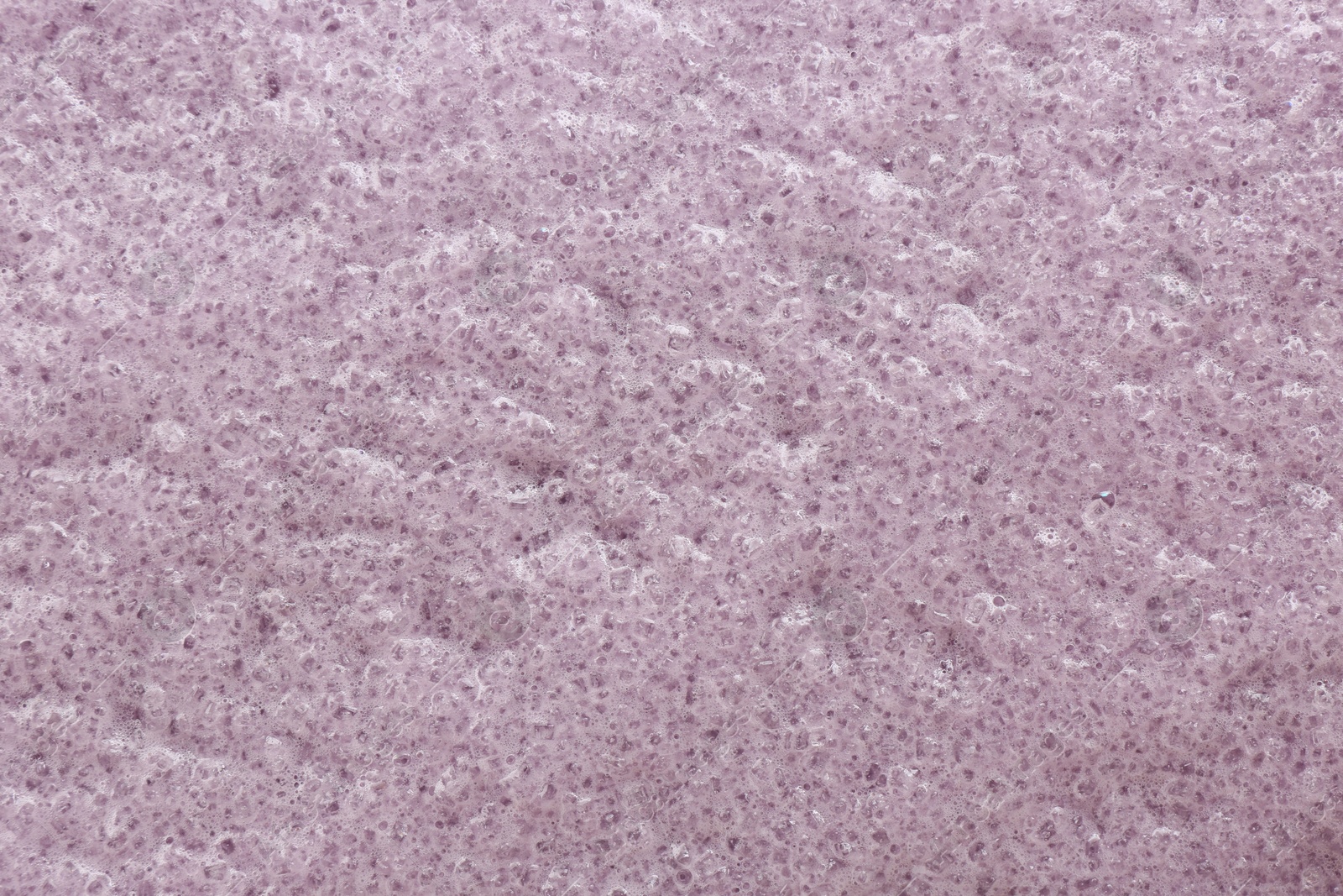 Photo of Sample of natural body scrub as background, closeup