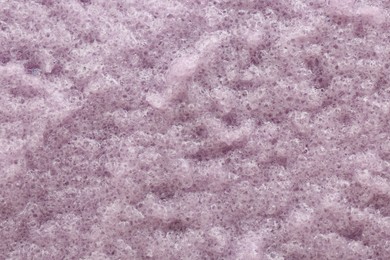 Photo of Sample of natural body scrub as background, closeup