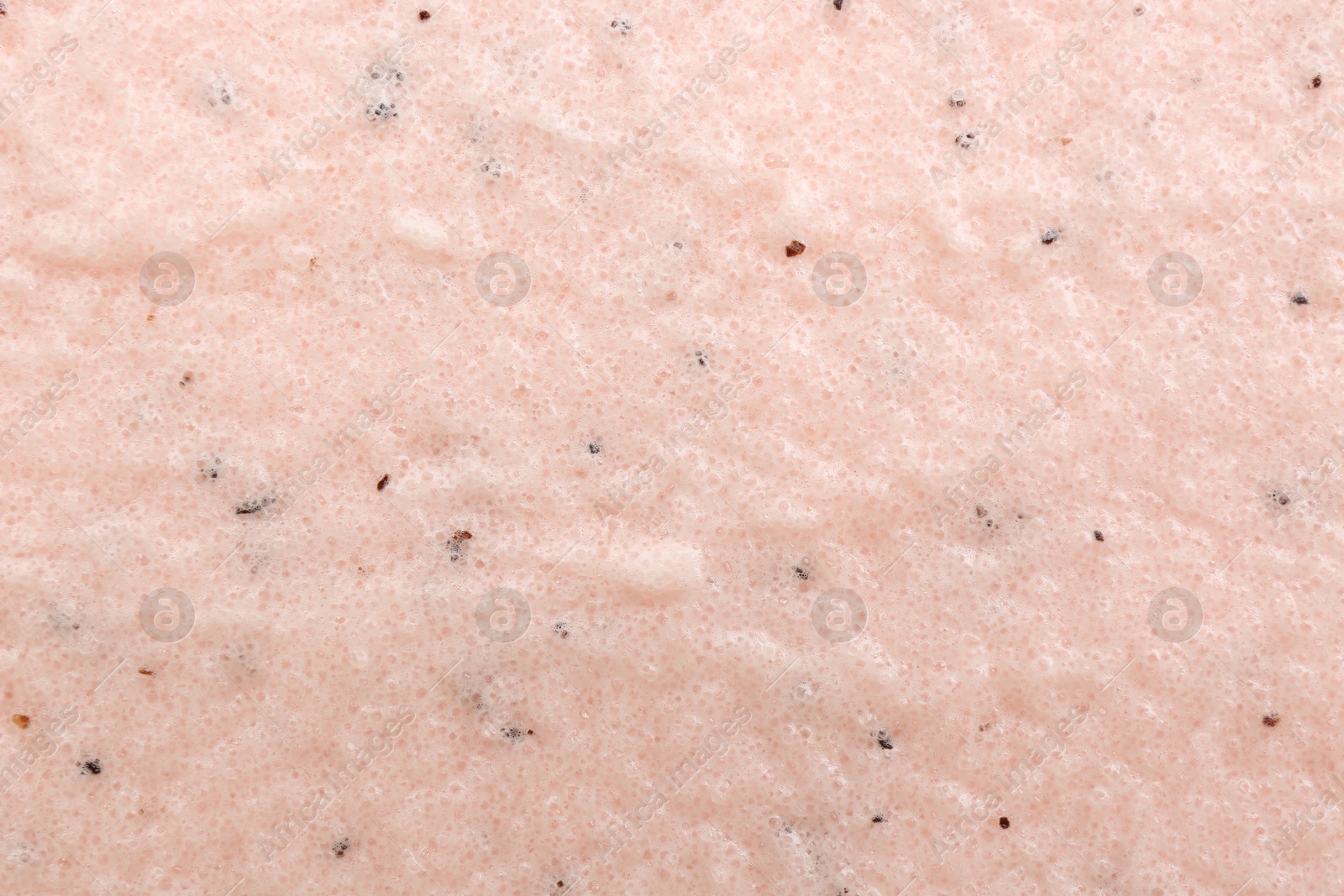 Photo of Sample of natural body scrub as background, closeup