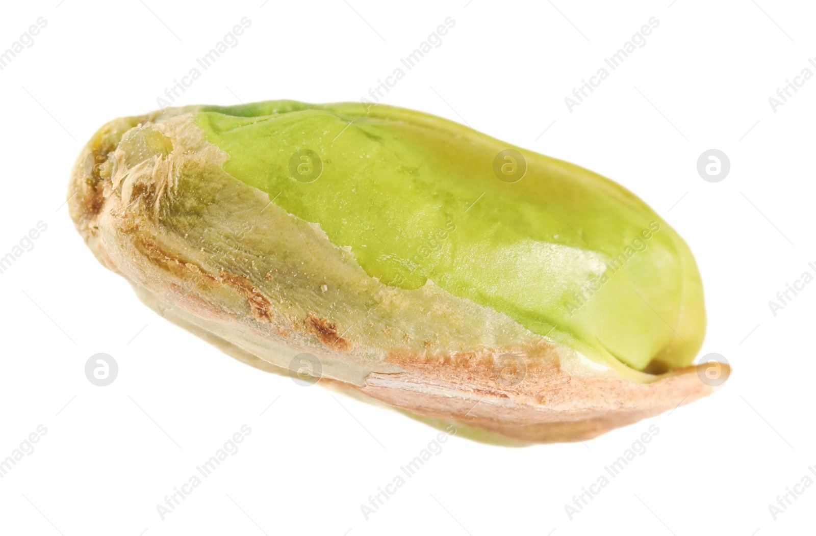 Photo of One peeled pistachio nut isolated on white