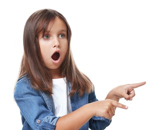 Portrait of scared little girl pointing at something on white background