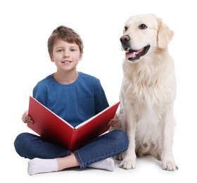 Boy reading book with his cute dog on white background