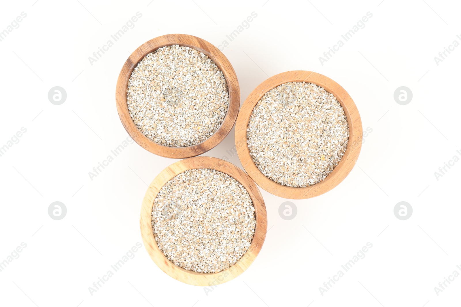 Photo of Rye bran in bowls isolated on white, top view