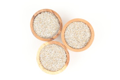 Photo of Rye bran in bowls isolated on white, top view