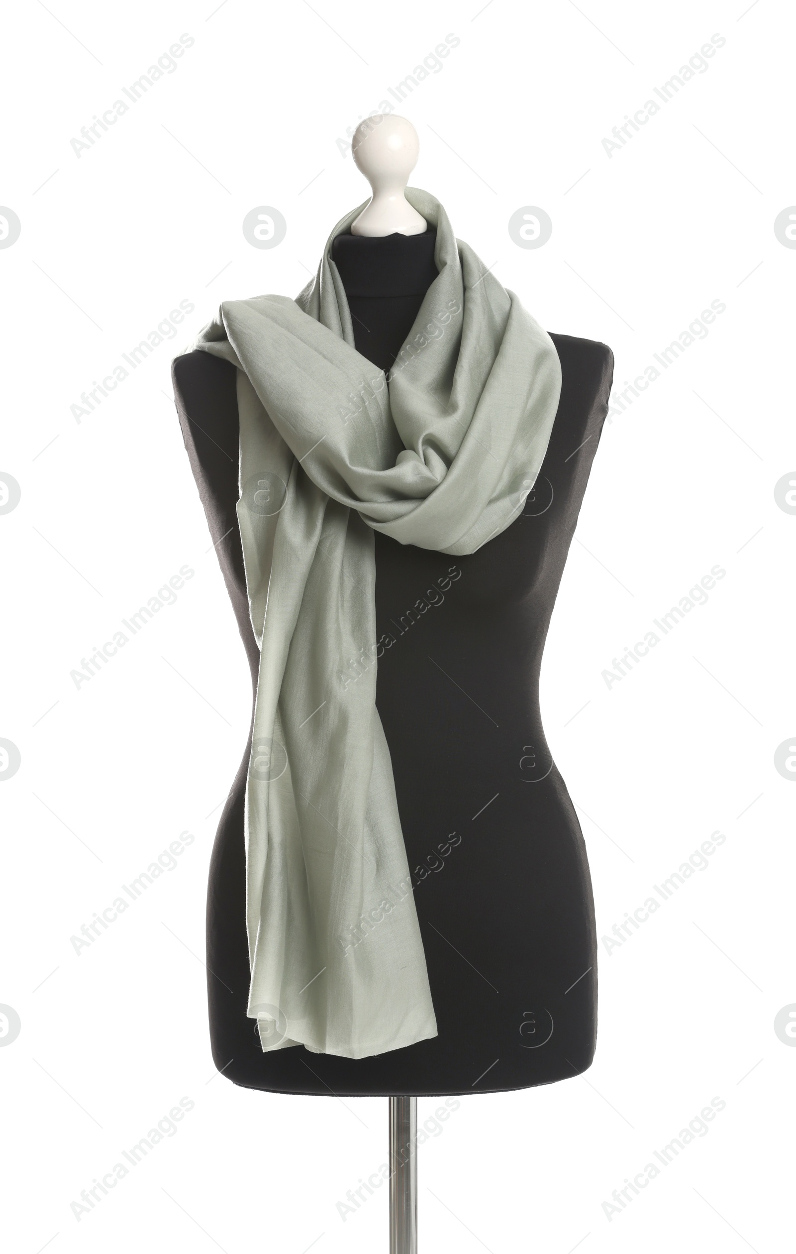 Photo of Draping grey fabric on female mannequin against white background