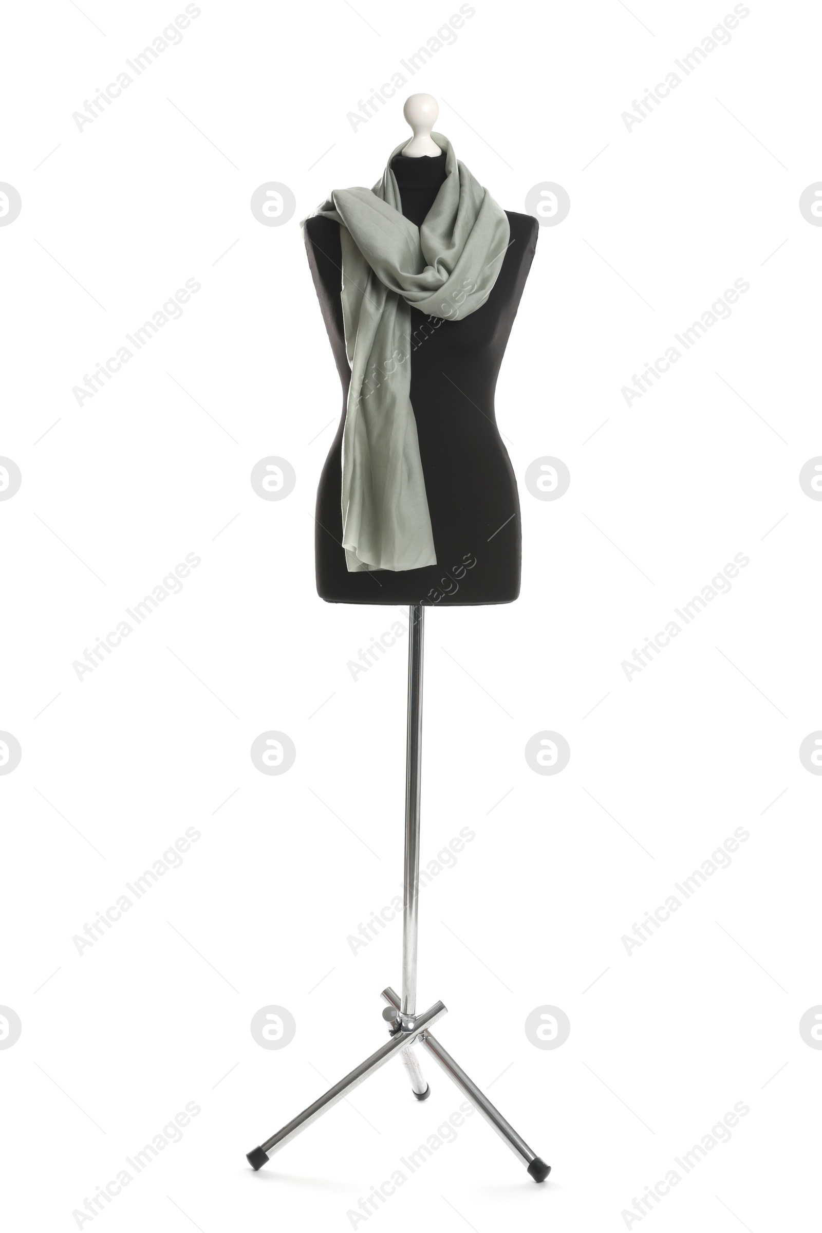 Photo of Draping grey fabric on female mannequin against white background