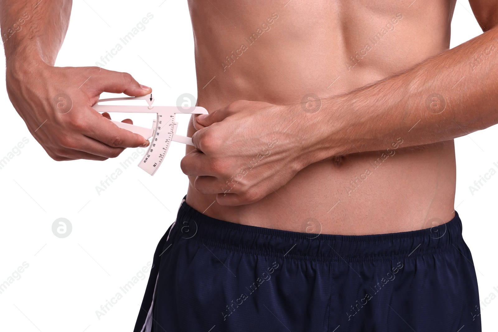 Photo of Man measuring body fat with caliper on white background, closeup