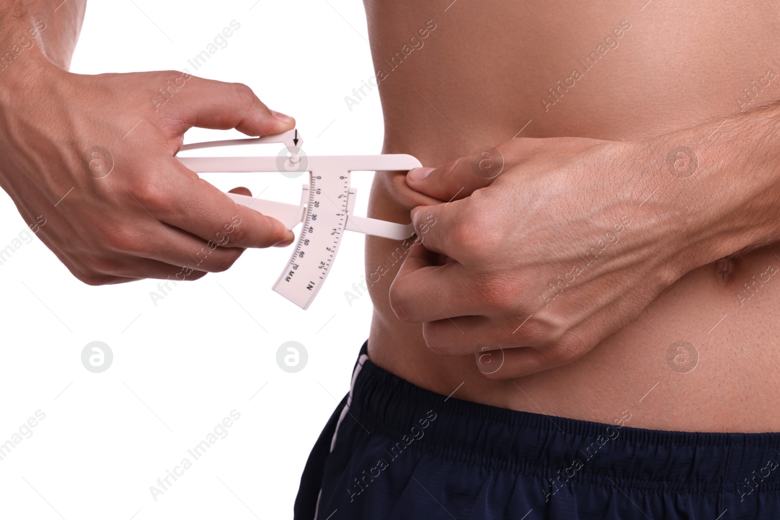 Photo of Man measuring body fat with caliper on white background, closeup