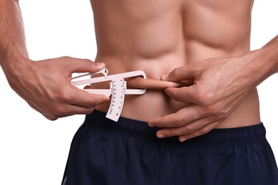 Photo of Man measuring body fat with caliper on white background, closeup