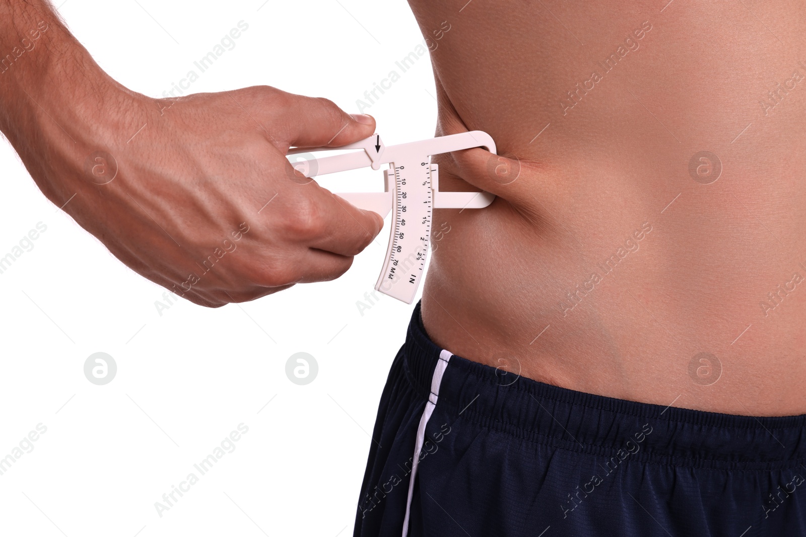 Photo of Man measuring body fat with caliper on white background, closeup