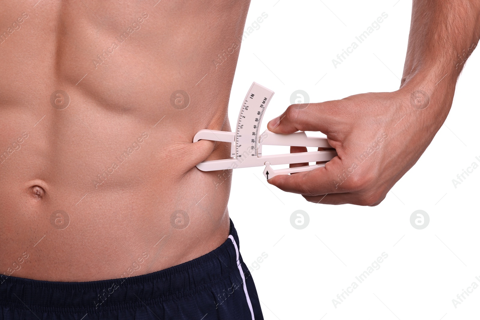 Photo of Man measuring body fat with caliper on white background, closeup