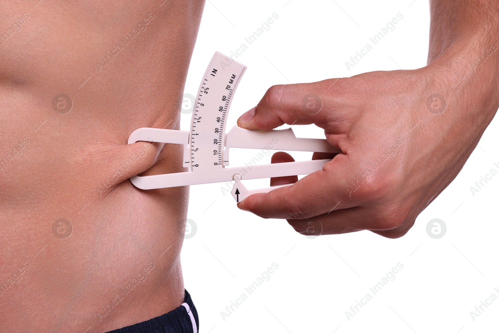 Photo of Man measuring body fat with caliper on white background, closeup