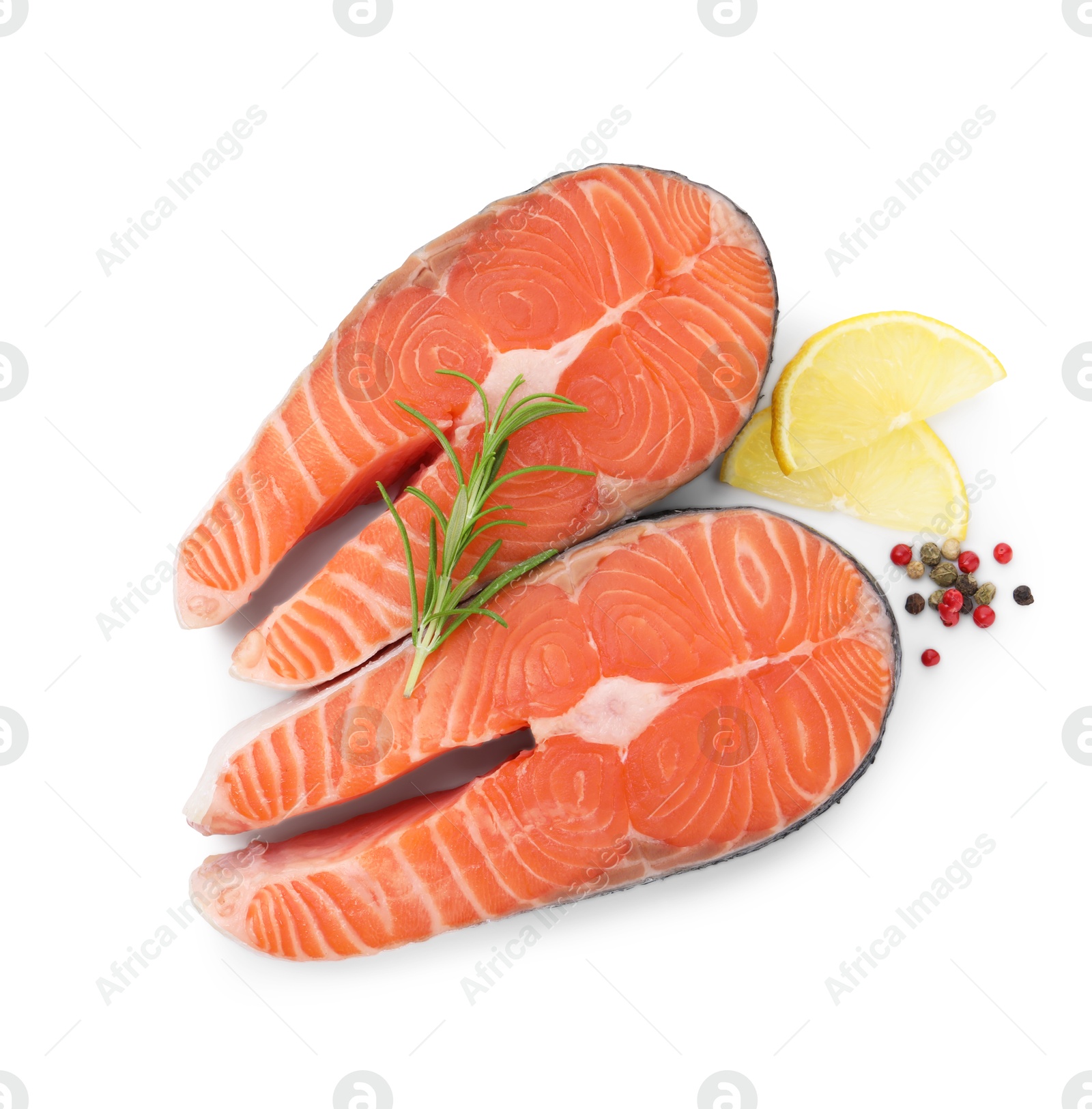 Photo of Steaks of fresh raw salmon and spices isolated on white, top view